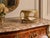 A gorgeous antique French gilt brass ormolu beveled glass footed jewelry casket or dresser box with hinged lid and lovely...