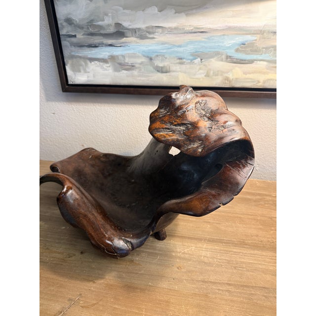 This is special sculptural piece. It is artfully carved from an intricate redwood burl. There are delicious details to...