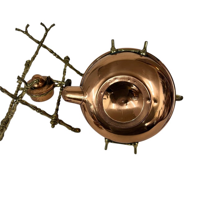 Antique early 1900s copper and brass spirit teapot kettle on brass stand with warmer. Measures on stand 11” w x 8” d x 12”...