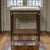 Louis XVI Gallery Table in solid mahogany with a refined marble top, pierced brass gallery, and elegant brass-capped feet...