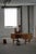 An elegant freestanding writing desk designed by Danish designer Henning Kjærnulf in the 1950s. Crafted in rich oak, the...