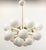 Italian oval shaped sputnik chandelier with 24 glossy white Murano glass globes mounted on brass frame in unlacquered...