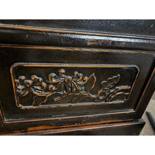Features • Vintage Chinese-style chinoiserie design • Distressed black lacquer finish • Hinged top opens to create a...