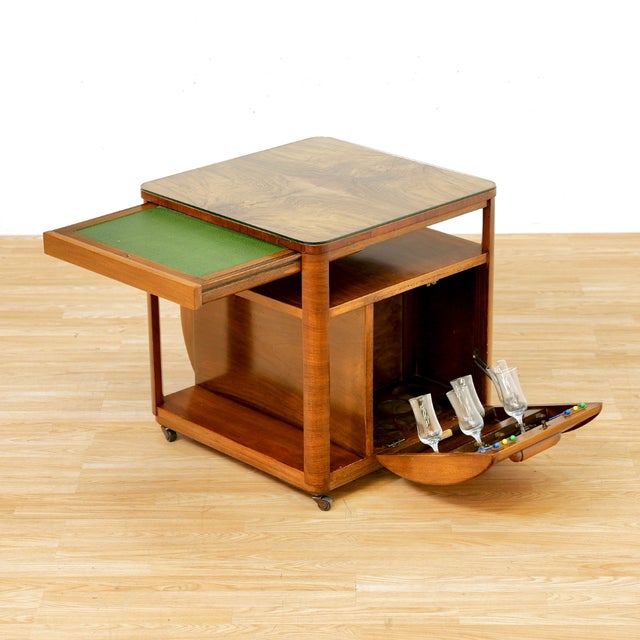 An exceptional mid century dry bar by Incorporall, blending streamlined Art Deco revival styling with highly functional...