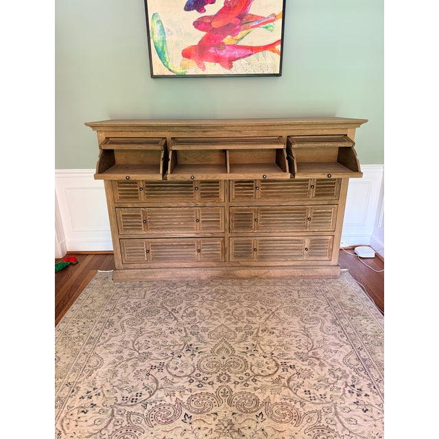 Oversized RH Shutter Dresser “Vintage” Restoration Hardware 9 drawer dresser. Top drawers open as trays and the bottom six...