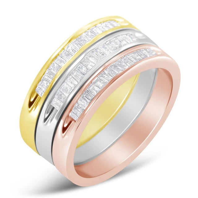 Sparkling with 17 sleek baguette-cut stones, this elegant and understated diamond wedding or anniversary band will be sure...