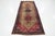 This beautiful Persian Hamadan handmade wool rug has a brown color field with multicolor accents all over the design. This...