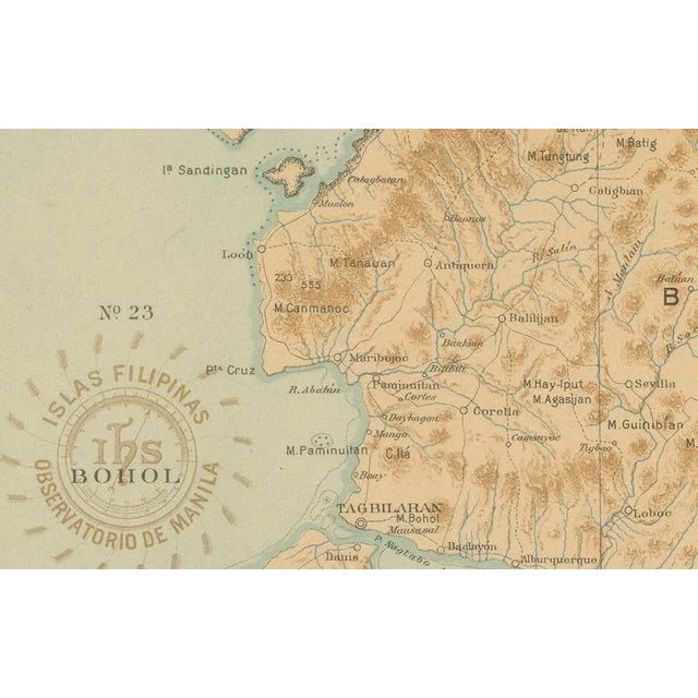 Title: map of the island of bohol – observatorio de manila, 1899 : this elegant chromolithographed map titled “islas...