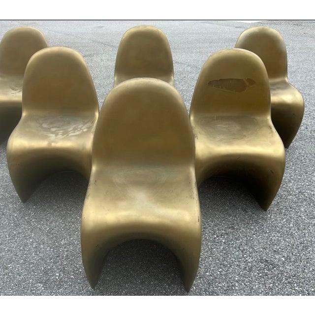 1990s. These chairs are made in ivory plastic material. They show traces of use since they're vintage, but they can be...