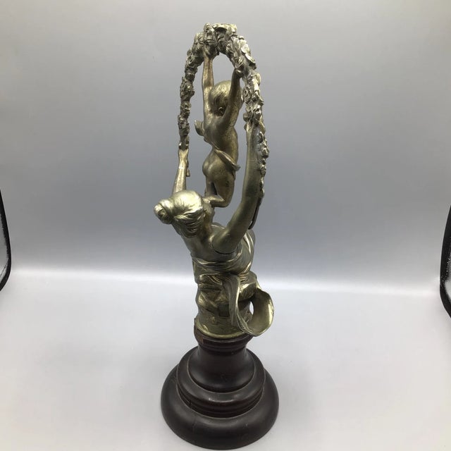 Late 19th Century Victorian Cast Metal Sculpture of a Female Supporting a Swinging Child in a Floral Wreath on a Walnut Base For Sale In Sacramento - Image 6 of 13