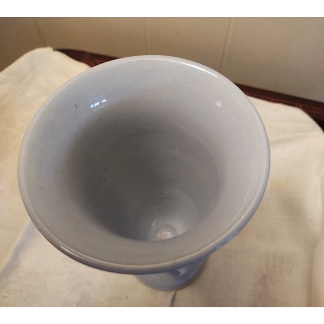 Elegant and timeless, this vintage vase by Wedgwood showcases the classic beauty of their renowned Queensware collection....