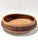 A beautifully hand-carved 1970s wooden bowl featuring a deeply carved floral band wrapping the exterior and additional...