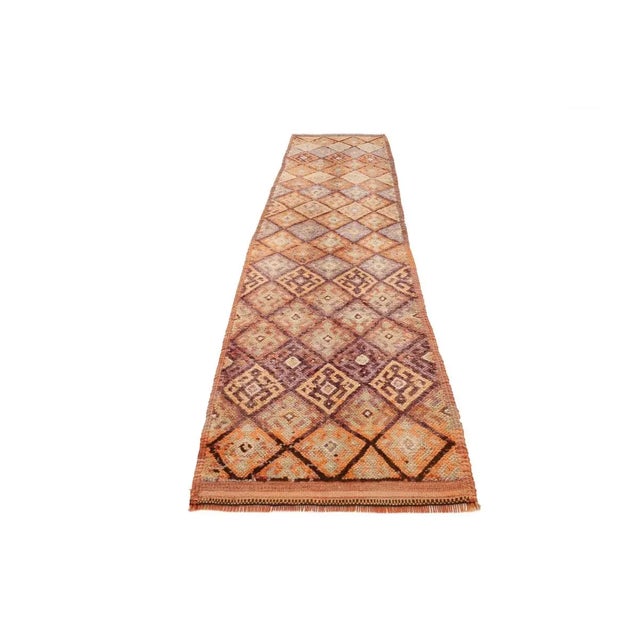 Handknotted vintage decorative Herki runner from Northern Iraq. Approximately 50-60 years old. In very good condition.