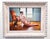 This oil painting captures a serene moment, with a nude figure gracefully reclining on a polished wooden floor beside an...