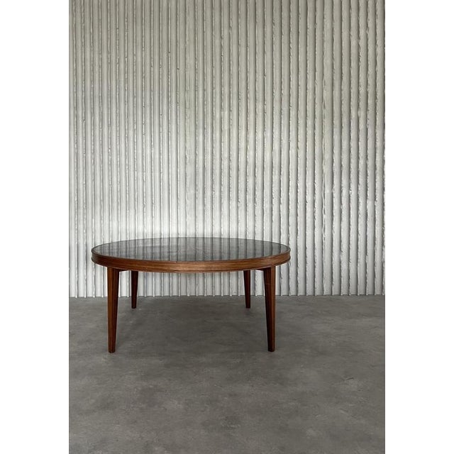 1960s h 50cm ø 121cm rare 1960s wooden coffee table with a stunning copper and enamel table top. The wooden base has a...