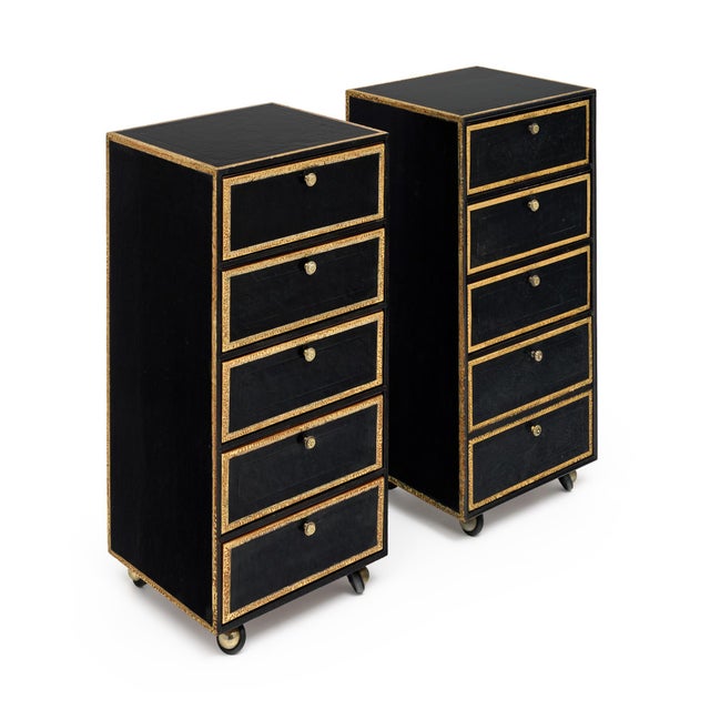 Pair of filing cabinets from the Art Deco period in France. This pair is covered in the original black leather with five...