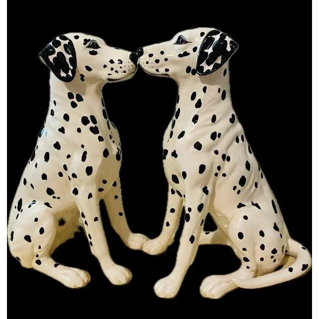 A rare pair of Royal Doulton Dalmatian made in England in perfect condition a collector sets. Porcelain made gorgeous to...