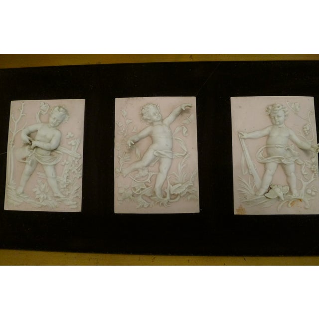 1900 - 1909 Vintage Bisque Porcelain Cherub Plaques in a Custom Frame. (4 Figures) For Sale - Image 5 of 18