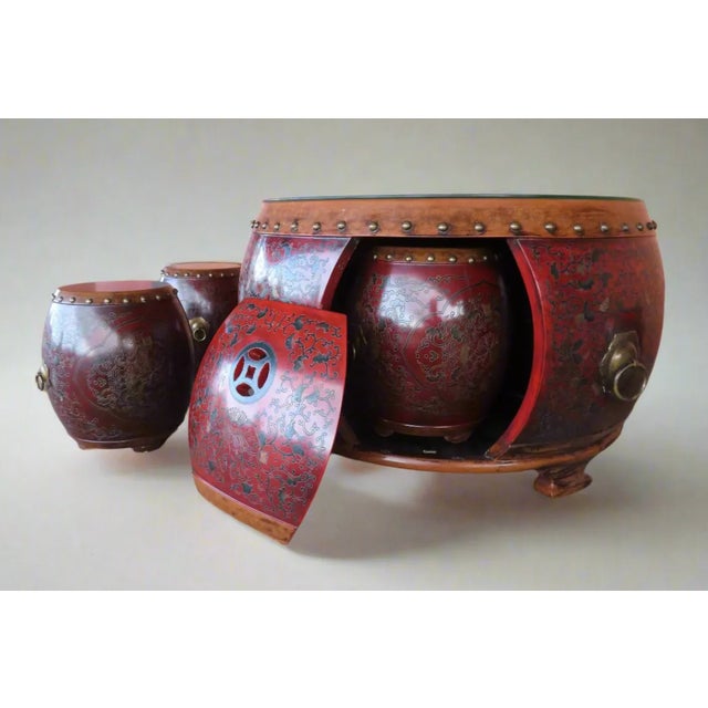 Fabulous and intricately designed red and brown coromandel Chinese drum barrel table from the Qing dynasty. This table was...