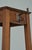 Stylish arts and crafts solid oak coat stand, having four shaped double hooks to each side on four outswept supports...