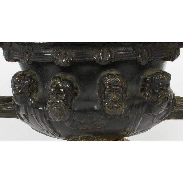 This is a beautiful antique French Grand Tour dark patinated bronze and ormolu urn with ormolu liner, C1850 in date. This...