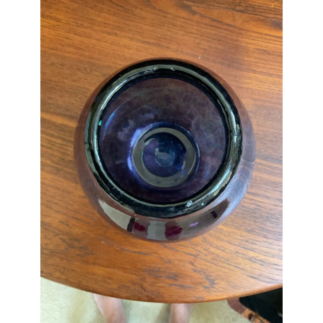 The color purple of this glass and mixed random color variation is amazing. It is a thick glass and has some weight.