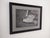 This graphite drawing captures a serene moment of a resting calf, its gentle features softened by the interplay of light...