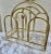 Vintage 1970s arched brass magazine or wood decor storage rack with enamel floral accents.