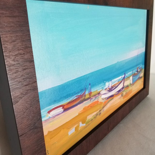 Painting by a Portuguese artist on heavy paper recently framed in a dark wood frame. We just love the colors! We have...