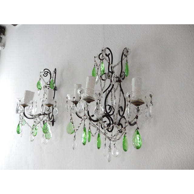 Will be rewired with appropriate sockets for country and ready to hang! Housing 3-lights each, sitting on vintage crystal...