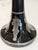 Pair of black amethyst glass candlesticks with silver overlay, circa 1930s–1950s. These pieces exemplify the Art Deco...