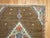 An early 20th century Persian Serab square size mat. Simple open design on a brown camel field. 2'4'' x 2'8''