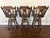A handsome set of three vintage oak swivel bar stools dating to March 1981, based on original production markings found on...