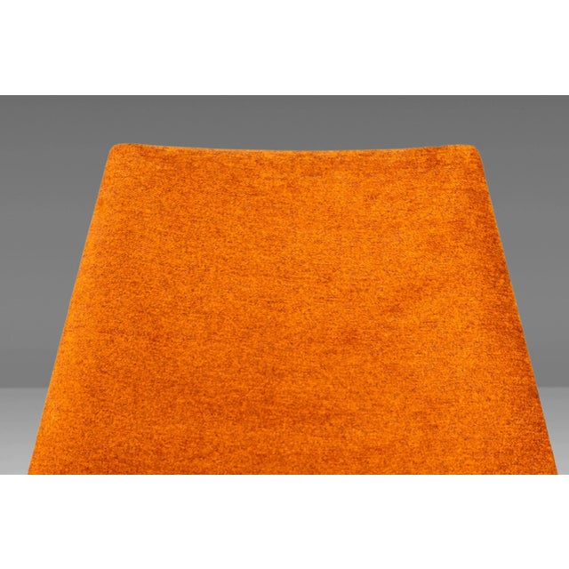 This is an ultra-rare set of 3-legged lounge chairs and two end tables designed by the legendary John Keal for Brown...