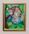 The artwork features a whimsical scene with an enchanted girl in a classic dress, accompanied by a large, vividly colored...