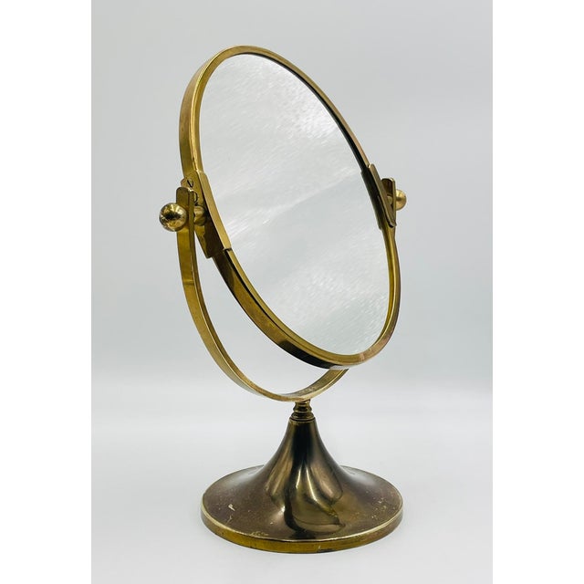 Elegant vintage vanity or tabletop mirror designed and manufactured in the United States by Charles Hollis Jones in the...