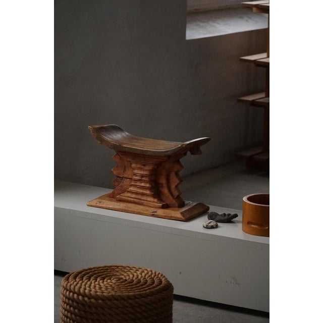 A highly decorative handcrafted ashanti stool, made in west africa in the 1970s. A unique design making it a one-of-a-kind...