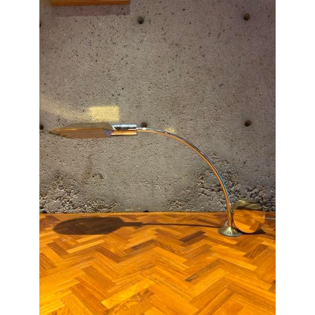 Rare and collectible Cedric Hartman desk lamp, c. 1970s–80s. This finely crafted piece features a polished brass...