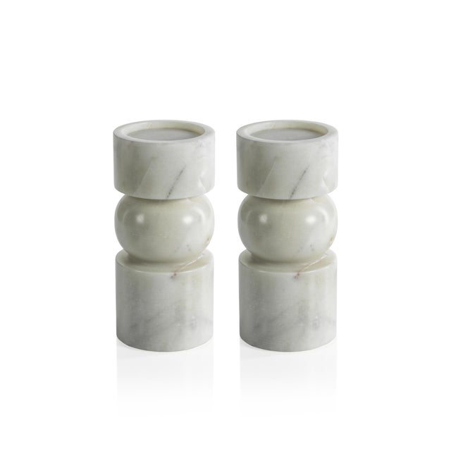 This set of pillar candle holders will bring a touch of elegance to any room. Crafted from white marble, these candle...