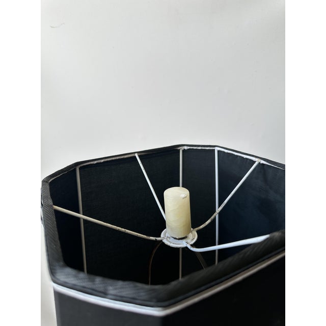 Vintage lamp dating back to the 1950s to the 1970s, artistically crafted in alabaster. The central body features a design...