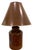Tole shade and base table lamp with hand painted Louis Vuitton design motif and logo. Height of base to top of finial 30”,...