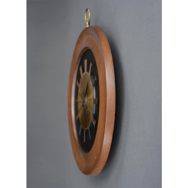 1960s Large Round Danish Modern Sculpted Walnut & Brass Clock With Roman Numerals For Sale - Image 5 of 13