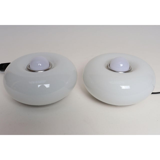 Pair of petite table donut-form lamps (model "Guscio") by Design STL Studio for the important lighting design firm,...