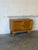 This compact storage piece features a classic rectangular silhouette with two front doors. The minimalist design...