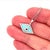 This Diamond Turquoise Sapphire 18k White Gold Evil Eye Pendant Necklace is a stunning piece of fine jewelry. The pendant...