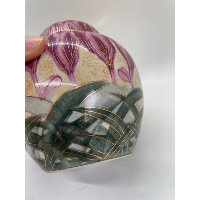 Capture the essence of Japanese craftsmanship with this exquisite and rare Kutani/Satsuma ginger jar. Adorned with...