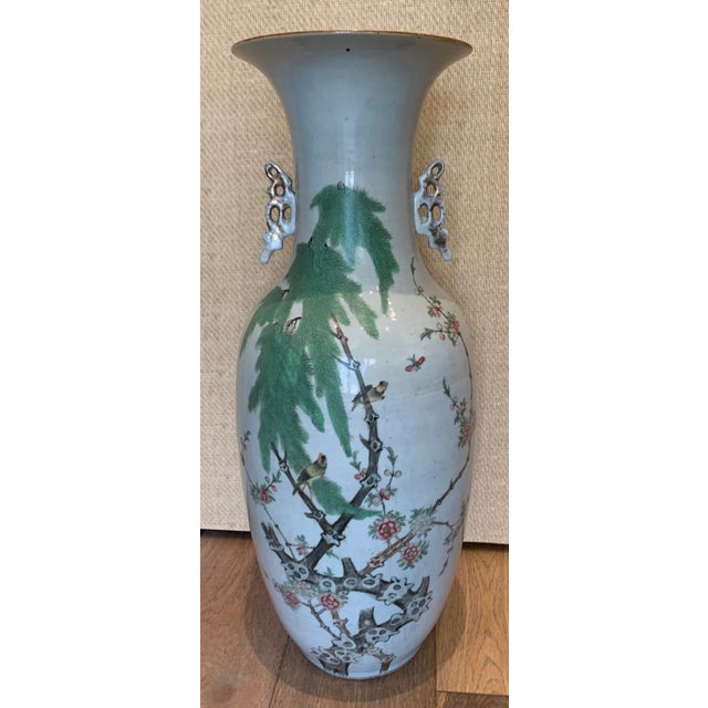 Vintage tall Asian hand painted ceramic decorative urn with pierced ceramic handles and painted scene of birds eating on a...