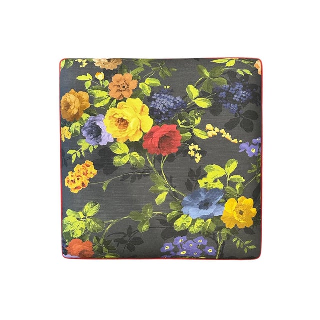 A gorgeous, Mackenzie Childs upholstered ottoman. Features a fully upholstered ottoman/parsons stool in the original...