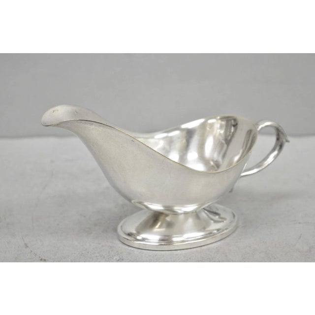 Vintage Victorian Silver Plated Trophy Cup Sauce Gravy Boat with Handle. Circa Mid 20th Century. Measurements: 4" H x 8" W...