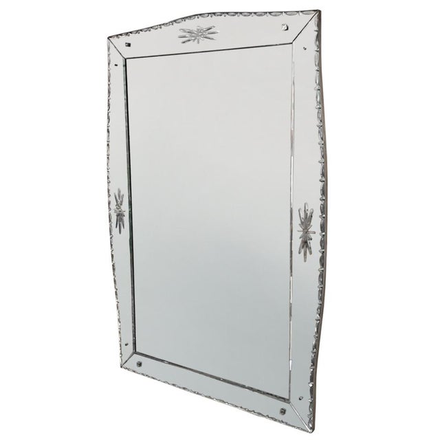 This is an elegant large mirror with a simple design in the Venetian style. Decorated with stars and a bevelled border....